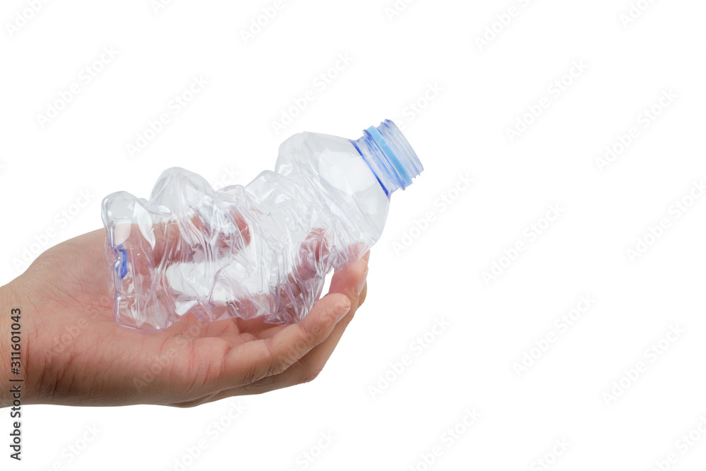 Garbage plastic bottles in the hands isolated on white background. Garbage plastic bottles in the hands isolated on white background.