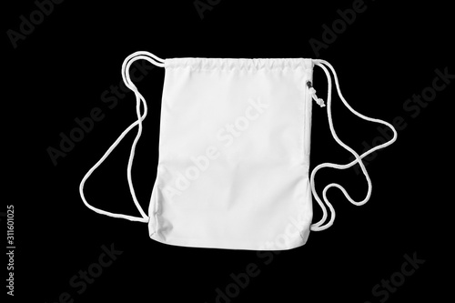 White backpack with white string on a black cut background. Mock-up.