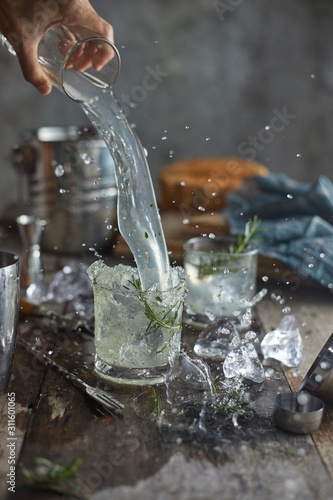 lemonade in glass with rosemary. . © musicphone1