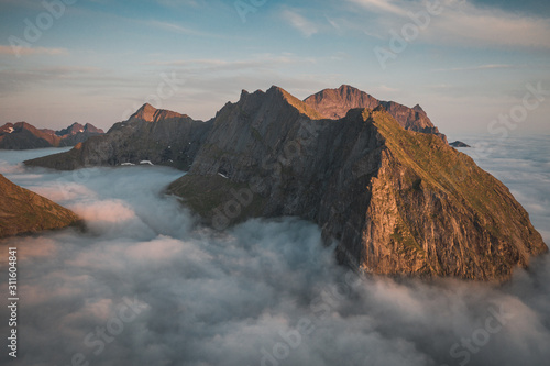 Clouds hovering around peaks in Lofoten, Norway