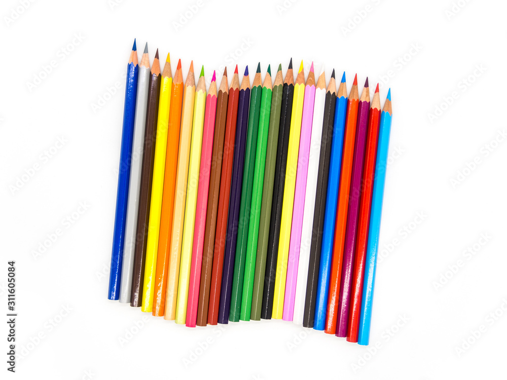 colored crayons arranged on white background abstract conceptual photo colored crayons arranged on white background abstract conceptual photo
