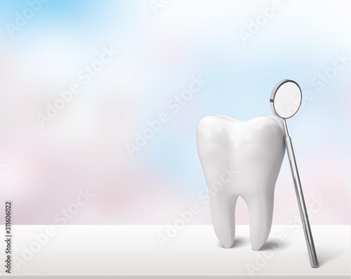 Human's white tooth with dentist mirror
