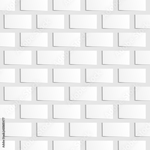 Background from empty envelopes of rectangular white bricks on a gray background, the ability to change the background color