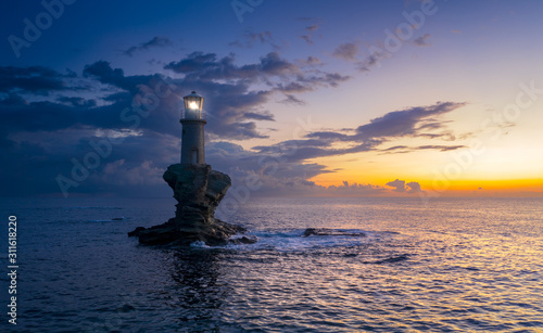 The beautiful Lighthouse Tourlitis of Chora in Andros island, Cyclades, Greece