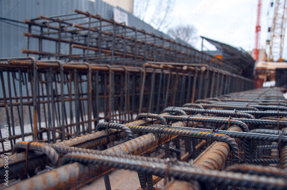 Rebars on the construction site. Building. The use of metal in modern construction.