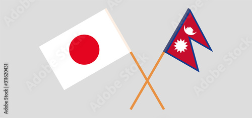 Crossed flags of Nepal and Japan