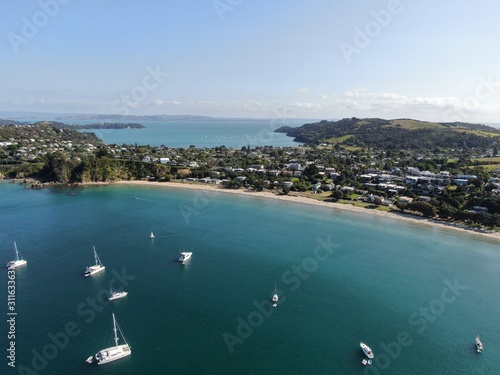 Waiheke Island, Auckland / New Zealand - December 24, 2019: The paradise island Waiheke with its stunning beaches, coastlines, hill terrains and vineyards photo