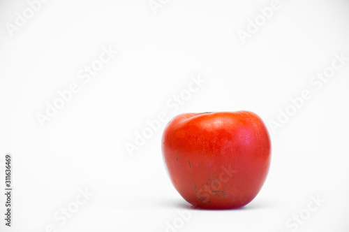 red ripe juicy fresh persimmon on a white background