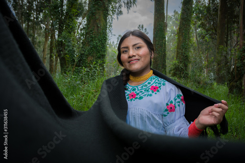 mujer latina con blusa bordada photo