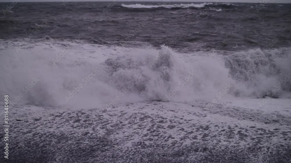 White waves breaking on the shore. Wave. Big waves. Storm. White waves breaking on the shore. Wave. Big waves. Storm.