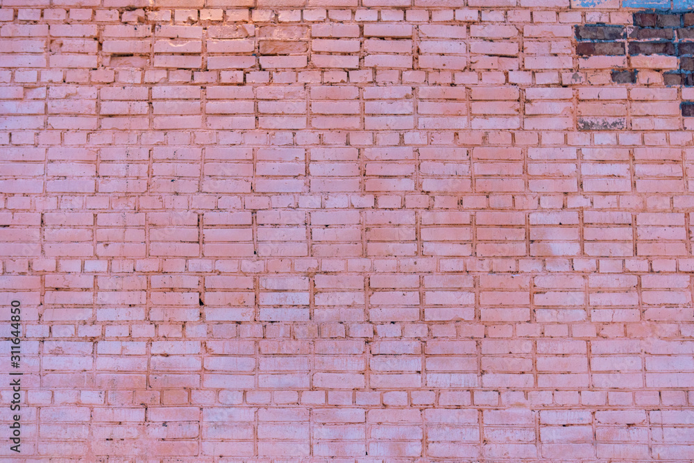 Fototapeta premium Low contrast texture of red bricks wall as a background