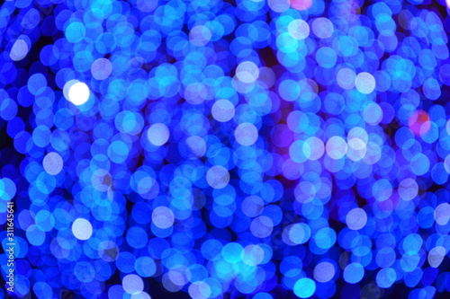 Blue abstract bokeh background for christmas or new year.