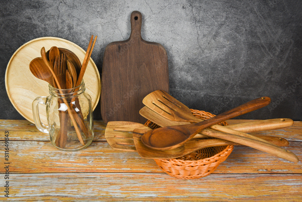 Natural kitchen tools wood products / Kitchen utensils background with  spoon fork chopsticks plate cutting board object utensil wooden concept  Stock Photo | Adobe Stock