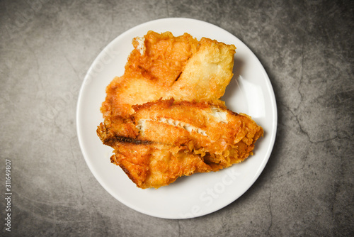 Photography fried fish fillet sliced for steak or salad cooking food , top view copy space -