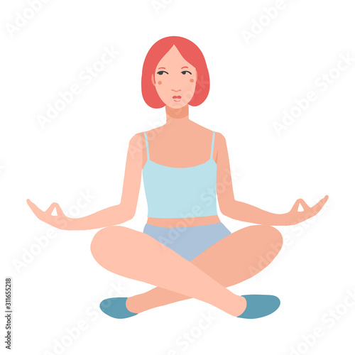 Young pretty woman performing yoga exercise. 