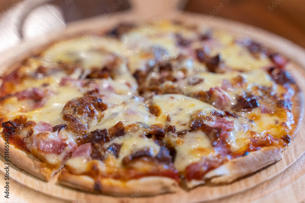Hot homemade barbecue chicken pizza with onions and cheese. Hot homemade barbecue chicken pizza with onions and cheese.