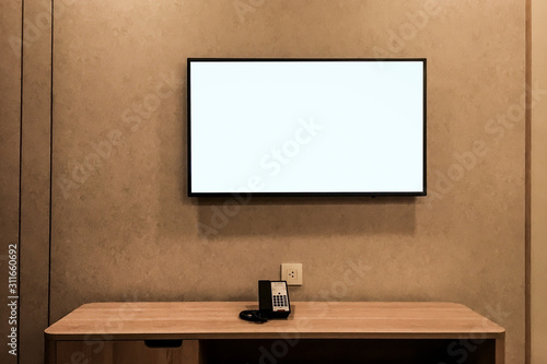 A blank billboard as a copy space for advertising media and content on the wall of living room