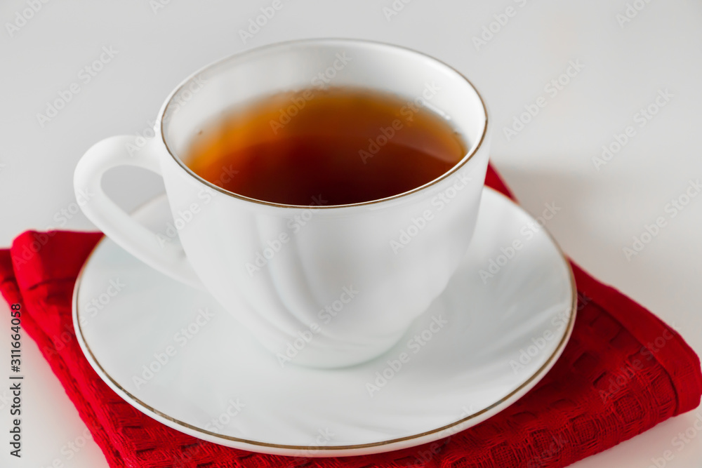White cup for coffee on a saucer White cup for coffee on a saucer