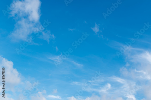 Blue sky background with clouds in clear day.