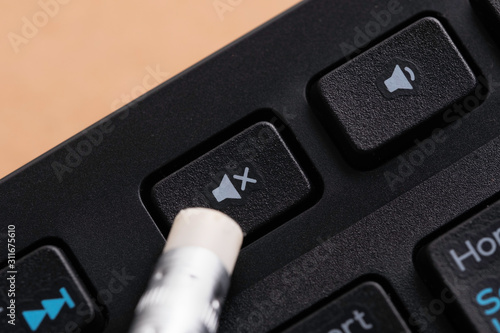 Slika na platnu Press mute button on keyboard. Soundless.