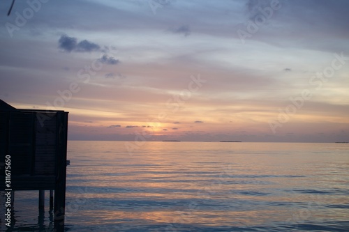 Sunset over Calm Maldivian Sea 