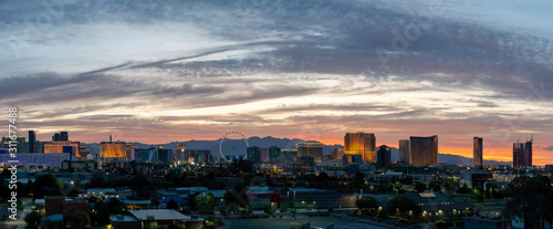 USA, Nevada, Clark County, Las Vegas. A panorama of the skyline casinos, hotels, and ferris wheel on the strip.