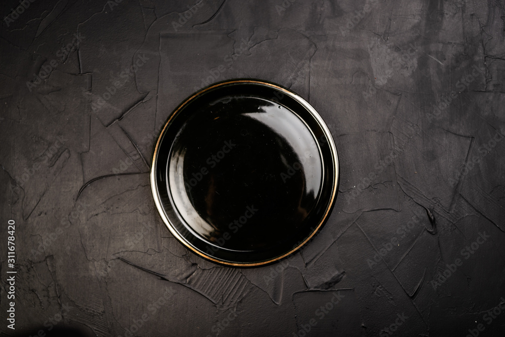 empty black dish on black background
