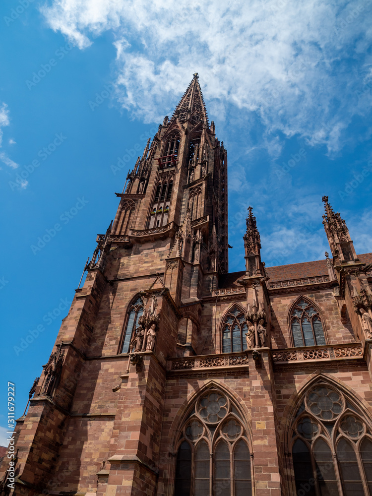 Freiburg, Germany - June 23rd, 2019: Freiburg Minster is the cathedral of Freiburg im Breisgau, southwest Germany.