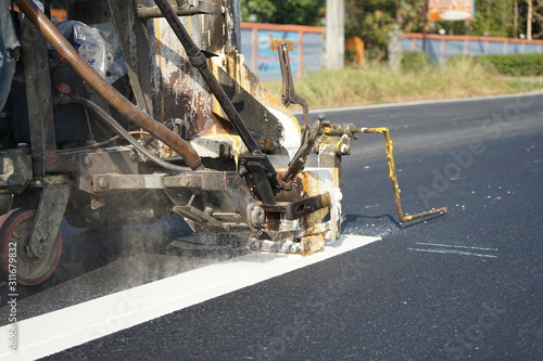 Technician is working White traffic color line Under construction, blurred images