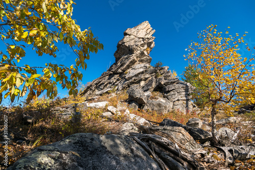Beautiful rock in the autumn forest