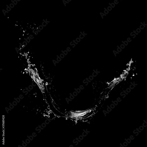 Water splashing isolated over a black background.