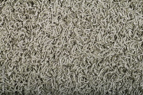 Carpet covering background. Pattern and texture of green carpet. Copy space