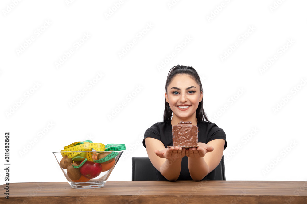 Woman having to choose healthy or unhealthy life Woman having to choose healthy or unhealthy life