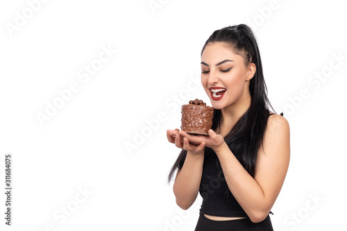  girl eating cake on white background