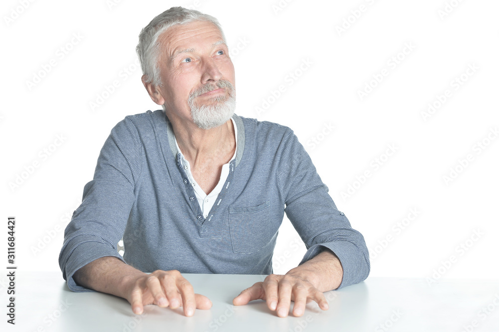 Portrait of senior man looking up isolated on white background Portrait of senior man looking up isolated on white background