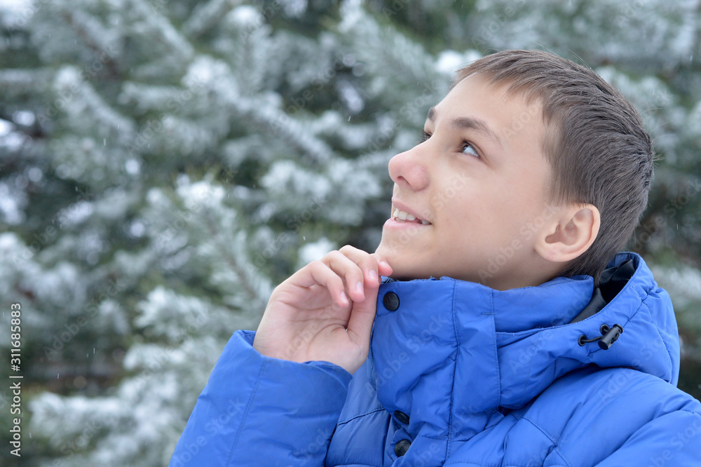 Portrait of teen boy portrait outdoors in winter Portrait of teen boy portrait outdoors in winter