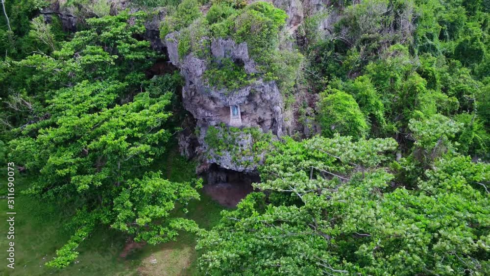 Sculpture of the Virgin Mary on a hillside near Playa Mar Chiquita in Minati Puerto Rico Sculpture of the Virgin Mary on a hillside near Playa Mar Chiquita in Minati Puerto Rico