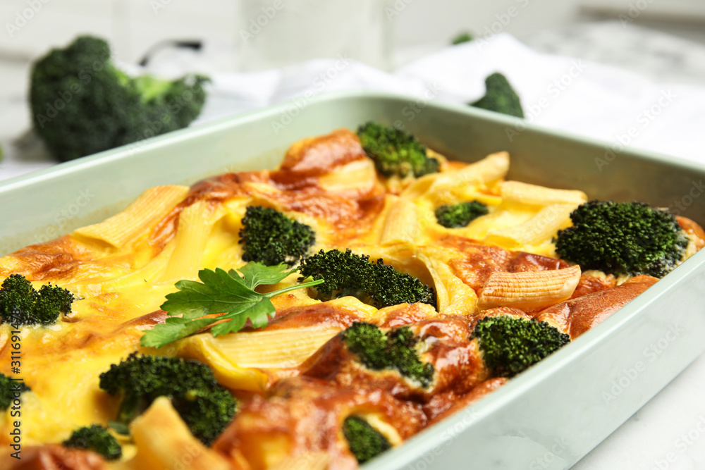 Tasty broccoli casserole in baking dish, closeup Tasty broccoli casserole in baking dish, closeup