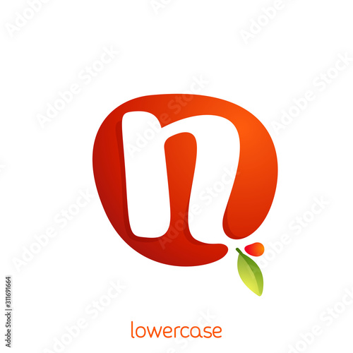 Lowercase letter n logo in fresh juice splash with green leaf.