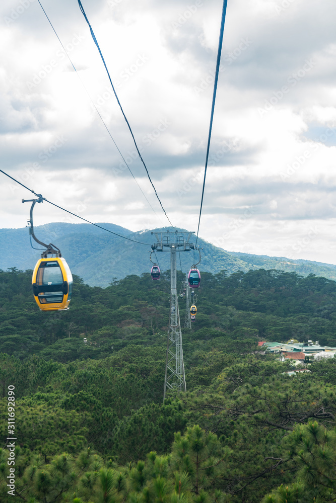 View from the Cable Car at Robin Hill, Truc Lam (Dalat, Vietnam)Aerial view for mountains, forest and lake.Amazing nature background.