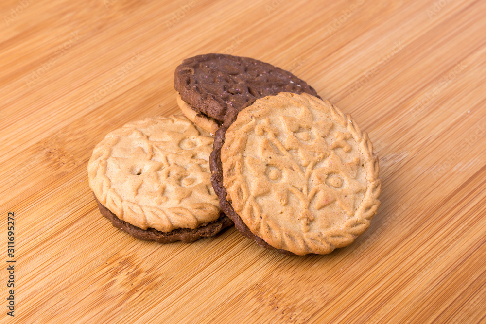 Several tasty hispanic sandwich snack cookies stacked together Several tasty hispanic sandwich snack cookies stacked together