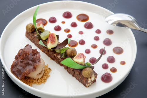 Fancy modern dessert on the white tray, Exquisite dish, creative restaurant meal concept, haute couture food