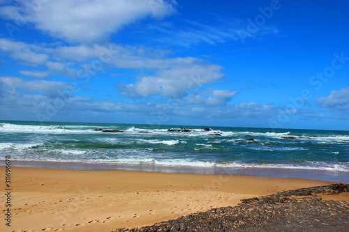 Cloudy blue sky at the beach