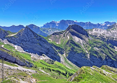 Rossalpelispitz or Rossaelplispitz and Zindlenspitz Mountains above the alpine Lake Wagitalersee (Waegitalersee), Innerthal - Canton of Schwyz, Switzerland photo