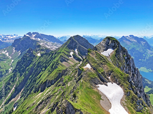 Rossalpelispitz or Rossaelplispitz and Zindlenspitz Mountains above the alpine Lake Wagitalersee (Waegitalersee), Innerthal - Canton of Schwyz, Switzerland photo