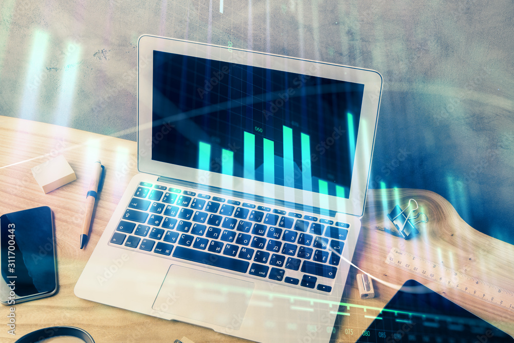 Multi exposure of graph and financial info and work space with computer background. Concept of international online trading. Multi exposure of graph and financial info and work space with computer background. Concept of international online trading.