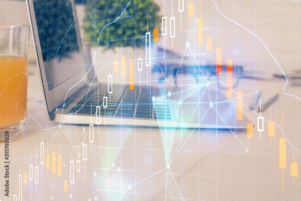 Stock market graph on background with desk and personal computer. Double exposure. Concept of financial analysis. Stock market graph on background with desk and personal computer. Double exposure. Concept of financial analysis.