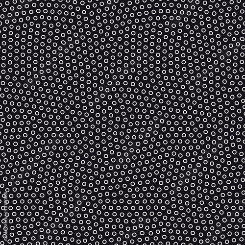 Seamless pattern with small black circles. Minimalist dots background. Black and white vector texture.