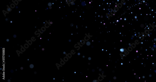 Flying dust particles on a black background © Yuriy