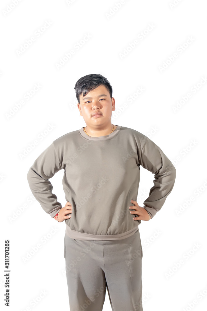 Portrait of fatty boy with two hands on waist and looking isolated on white background Portrait of fatty boy with two hands on waist and looking isolated on white background